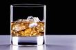 A glass of whisky with ice cubes