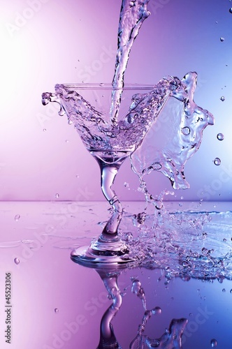 Photo: Martini Splashing Into a Glass Martini Splashing Into a Glass