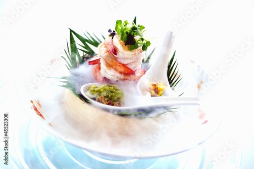 Photo: Scampi salad served on dry ice Scampi salad served on dry ice