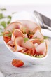 Ham with rocket and tomatoes