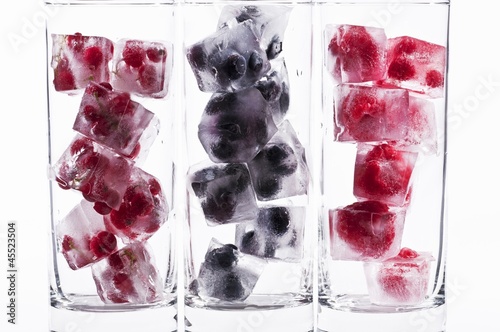 Photo: Three glasses with various berry ice cubes Three glasses with various berry ice cubes