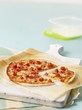 Tortilla pizza with ham and tomatoes