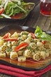 Wagon Wheel Pasta with Homemade Pesto Sauce and Tomatoes