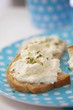 Slices of bread topped with cottage cheese and cress