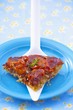 A slice of tomato tart on a cake slice