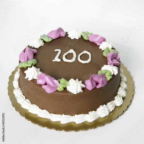 Photo: Chocolate Frosted Birthday Cake with the Number 100 On It Chocolate Frosted Birthday Cake with the Number 100 On It