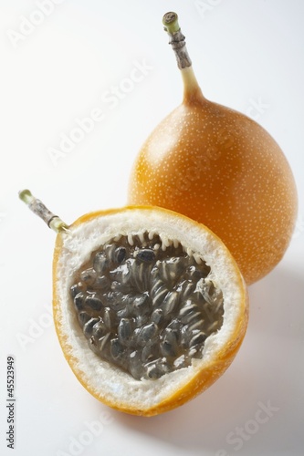 Photo: Granadilla, whole and halved Granadilla, whole and halved