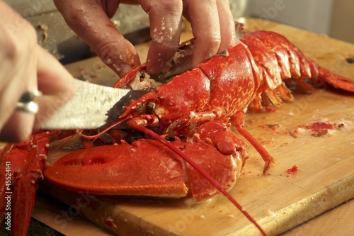 Photo: Breaking up a cooked lobster Breaking up a cooked lobster