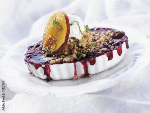 Photo: Wild Berry Crisp A la Mode in an Oval Dish Wild Berry Crisp A la Mode in an Oval Dish