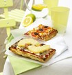 Two different focaccia pizzas