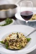 Fettuccini Pasta with Pancetta, Peas, Artichoke Hearts, Wild Mushrooms and Parsley