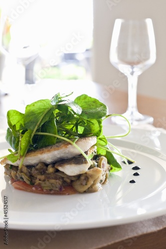 Photo: Sea bass on a bed of vegetables with water cress Sea bass on a bed of vegetables with water cress