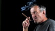 Man smokes cigar