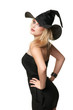 beautiful witch holds a hat