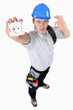 high angle shot of young electrician showing socket