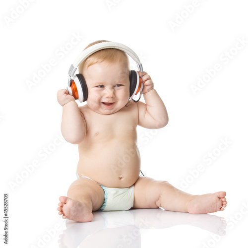 Photo: baby with headphone. young DJ baby with headphone. young DJ