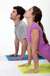 Young couple in the gym