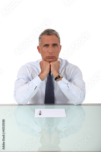 Photo: Serious mature businessman Serious mature businessman