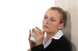 Businesswoman taking five minutes with a hot drink
