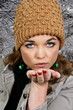 Woman Blowing a Kiss
