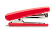Red stapler on a white background.