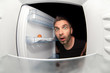 man and an empty fridge