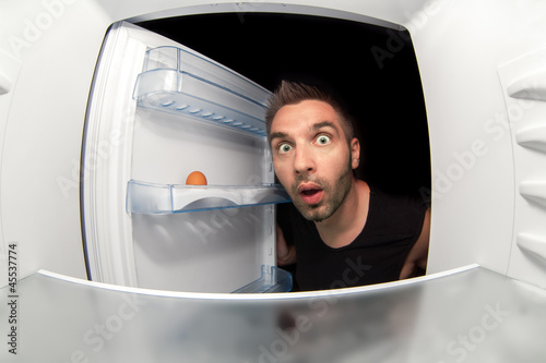 Photo: man and an empty fridge man and an empty fridge