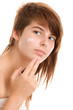 Woman applying facial cream