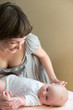 Happy Mother with her newborn baby