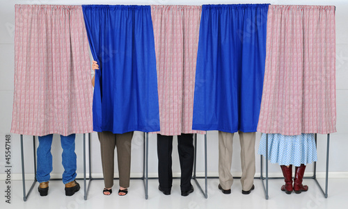 Photo: People in Voting Booths People in Voting Booths