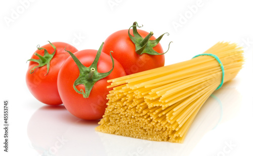 Photo: tomatoes and pasta on white background tomatoes and pasta on white background