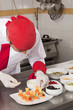 Foto: chef garnishing canapes chef garnishing canapes