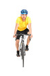 Full length portrait of a man with helmet riding a bycicle