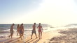 Group Of Teenage Friends Enjoying Beach Holiday Together