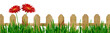 Fence with grass and flowers