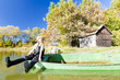 fisher woman sitting on boat