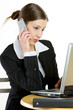 telephoning businesswoman with a laptop