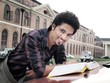 Indian / Asian college student studying in campus.