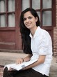 Indian / Asian college student studying in campus.