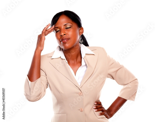 Photo: Charming businesswoman with headache Charming businesswoman with headache