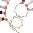 Hands holding toothwheels, teamwork concept