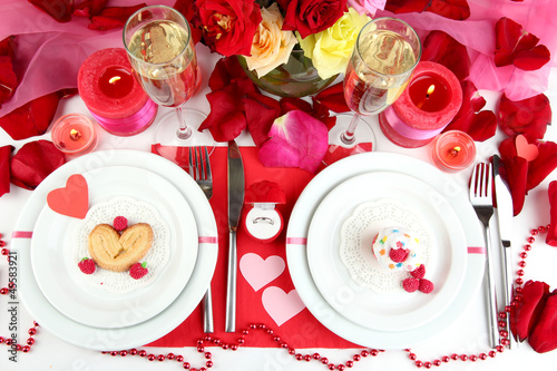 Photo: Table setting in honor of Valentine's Day close-up Table setting in honor of Valentine's Day close-up