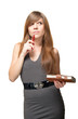 Beautiful young woman with pen and datebook deep and serious tho