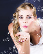 Playful Bride Blowing Bubbles At Wedding Reception