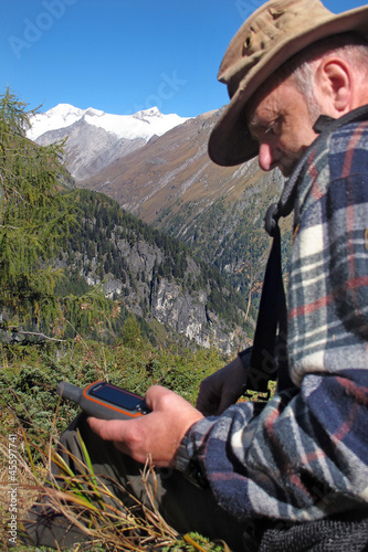 Photo: Hiker with GPS - Bergsteiger with GPS Hiker with GPS - Bergsteiger with GPS