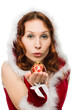 Photo: Beautiful woman in a Christmas dress sends a kiss Beautiful woman in a Christmas dress sends a kiss