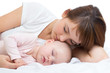 Photo: Young mother and her baby sleeping together Young mother and her baby sleeping together