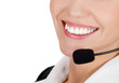 Foto: Cheerful call center operator against white background Cheerful call center operator against white background