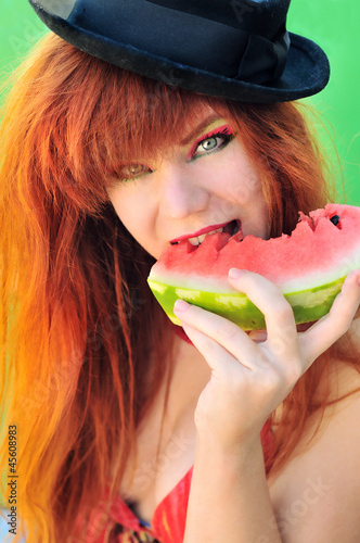 Photo: girl eating watermelon girl eating watermelon