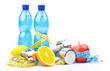 fitness equipment and fruits isolated on white